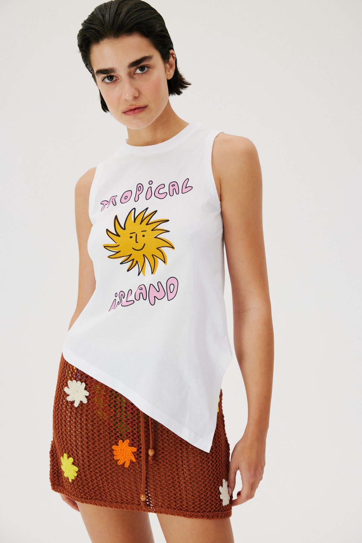 Tropical Asymmetric Top